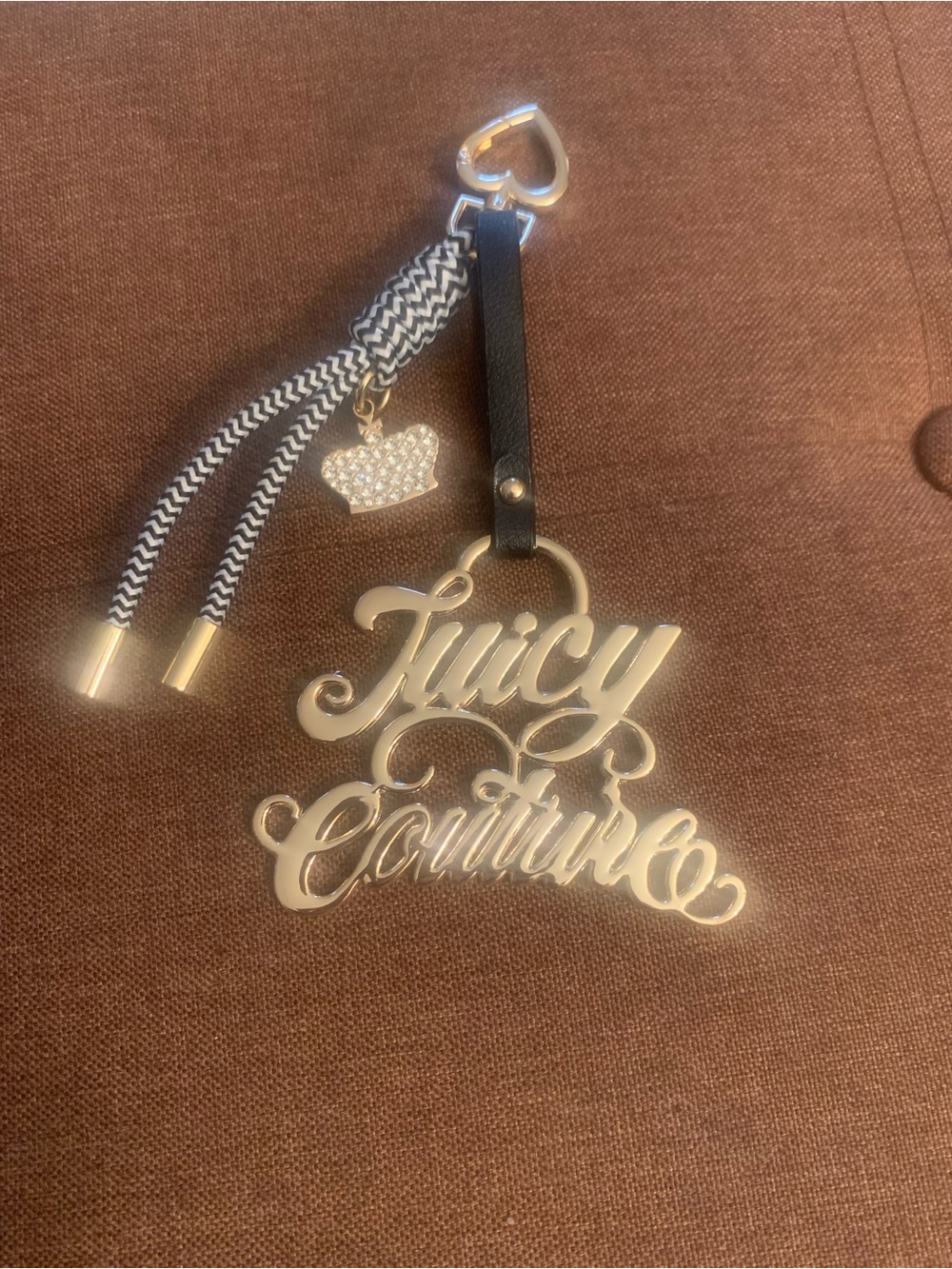 Juicy Couture Gold Script Logo Pendant with Black & White Tassels